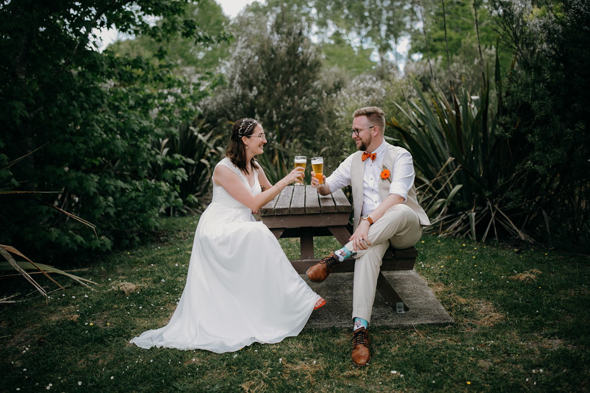 coatesville settlers hall wedding auckland bride and groom beer cheers photos by sarah weber photography