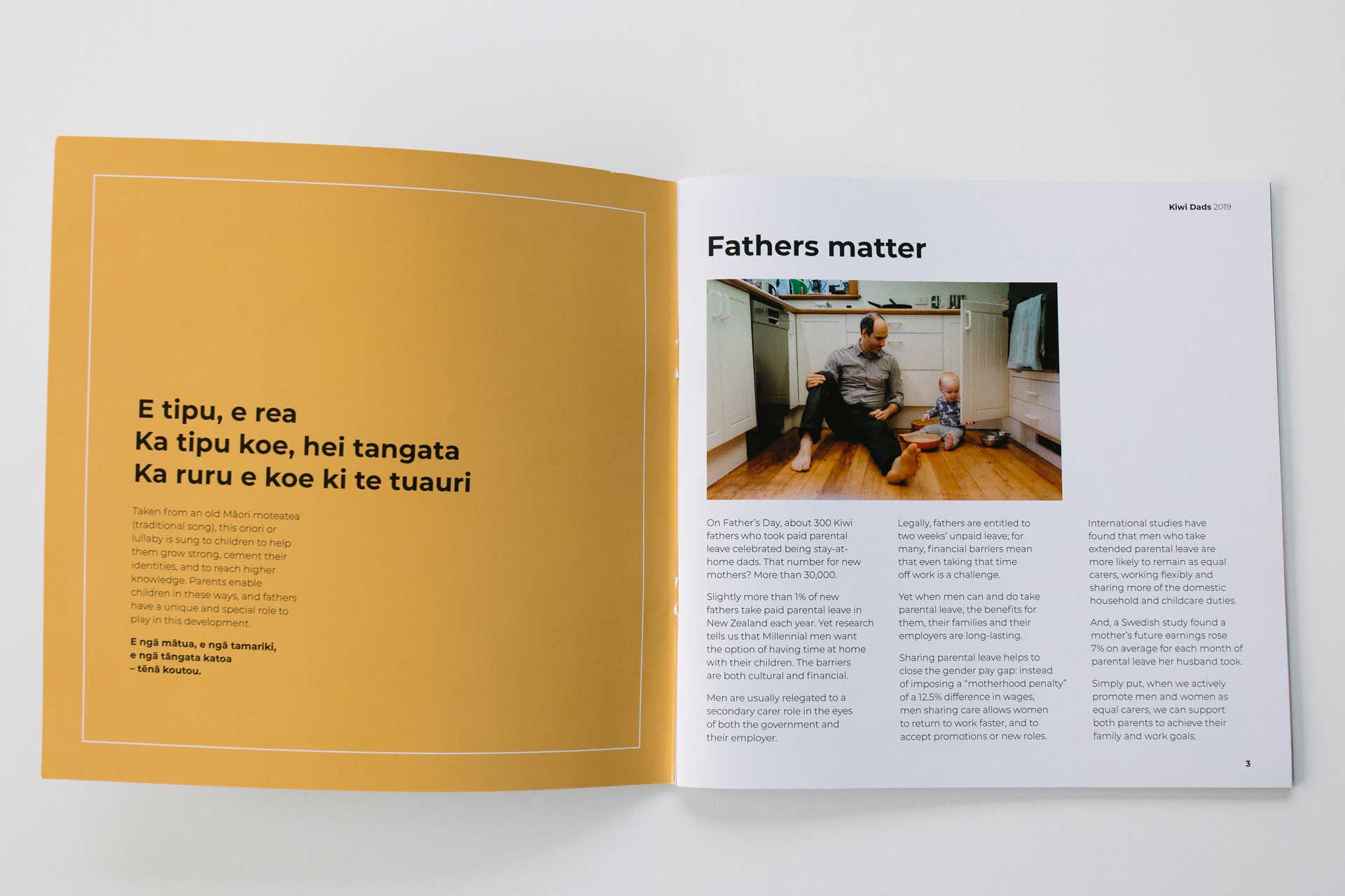 kiwi dads booklet inside cover photo of peter nunns playing with child photos by sarah weber photography